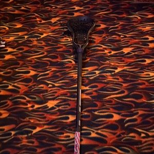 All black true alloy stick and head with black mesh